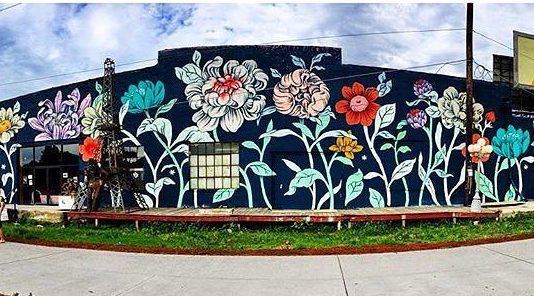 See How Flower Murals Can Transform Any Gray Building