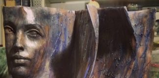 These Bronze Book Sculptures Have Placid Faces Emerging From its Pages