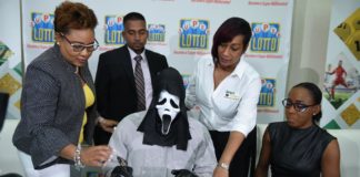 Lottery Winner Wears ‘Scream’ Mask as They Claim Their Prize