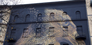 Artist Brings City Streets to Life With Massive Surreal Paintings