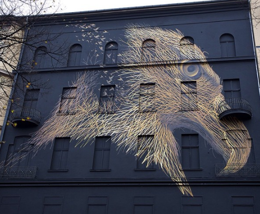 Artist Brings City Streets to Life With Massive Surreal Paintings