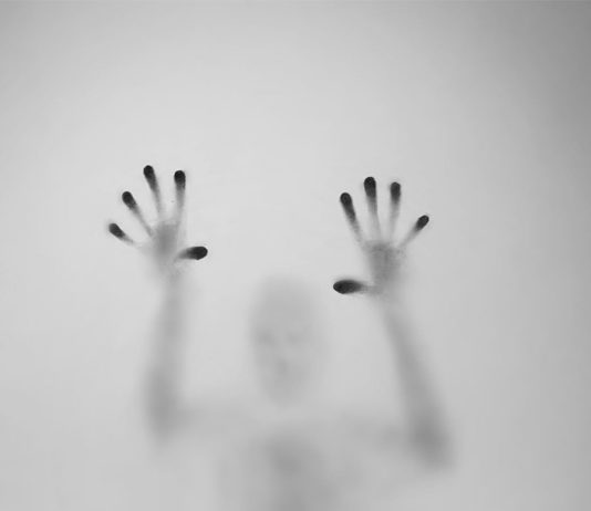 Ghostly Figures Reach from Paper in these Spooky Drawings