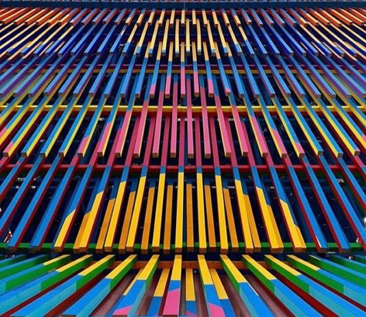 A Colorful Pavilion In Contrast With Raw Brick Architecture? Yes, Please!