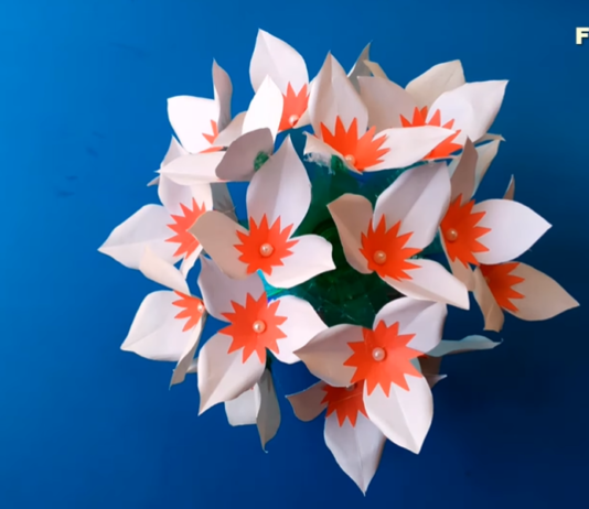 Girl Makes Beautiful Paper Flower Decorations